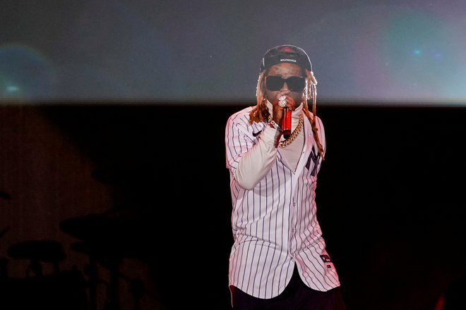 Slavljencu je na zabavi odpel skladbo ali dve tudi njegov raperski prijatelj Lil Wayne. FOTO: Eduardo Munoz Reuters
