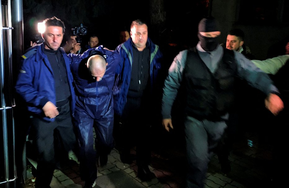 Fotografija: Osumljenega organiziranje ugrabitve in umora, so aretirali na meji. FOTO: Ognen Teofilovski, Reuters