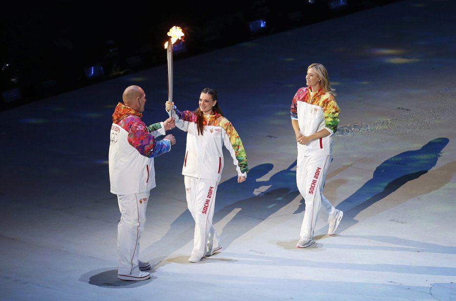 Fotografija: Ruskim in beloruskim športnikom in športnicam so dovolil nastopanje. FOTO: Issei Kato, Reuters
