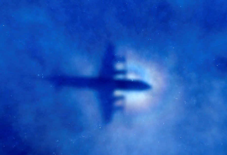 Fotografija: Še danes ni točno jasno, kje je končalo letalo družbe Malaysian Airlines let MH370 FOTO: Pool New Reuters