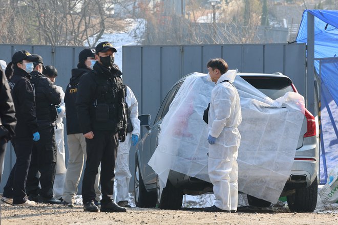 Njegovo truplo so našli v avtomobilu. FOTO: Yonhap Via Reuters