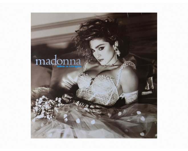 Kot nevesta na naslovnici Madonna ni predstavljala kreposti, pač pa je bila predmet poželenja. FOTO: Profimedia