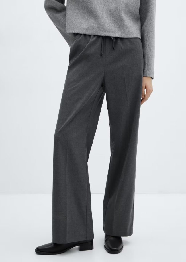 Široke hlače v sivi barvi bodo res prijazne do številnih kombinacij. Foto: Mango FOTO: Mango