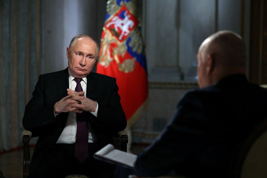 Fotografija: Vladimir Putin med intervjujem FOTO: Gavriil Grigorov Via Reuters
