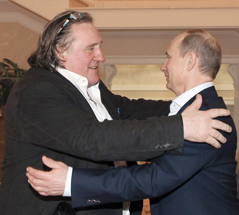 Fotografija: Z Vladimirjem Putinom sta dobra prijatelja. FOTO: Ria Novosti/Reuters